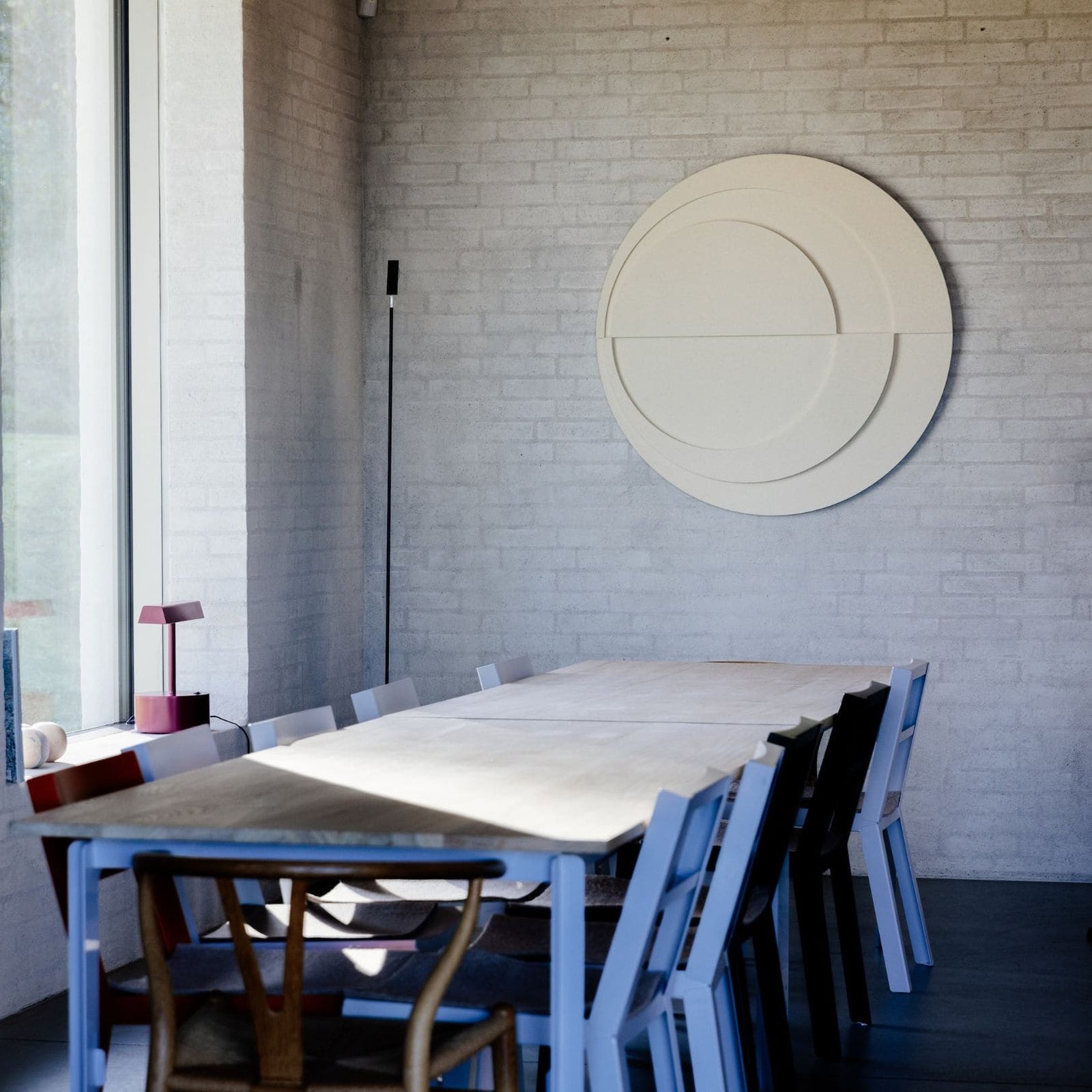 Large round acoustic panel from Arturel, enhancing sound absorption and aesthetic appeal