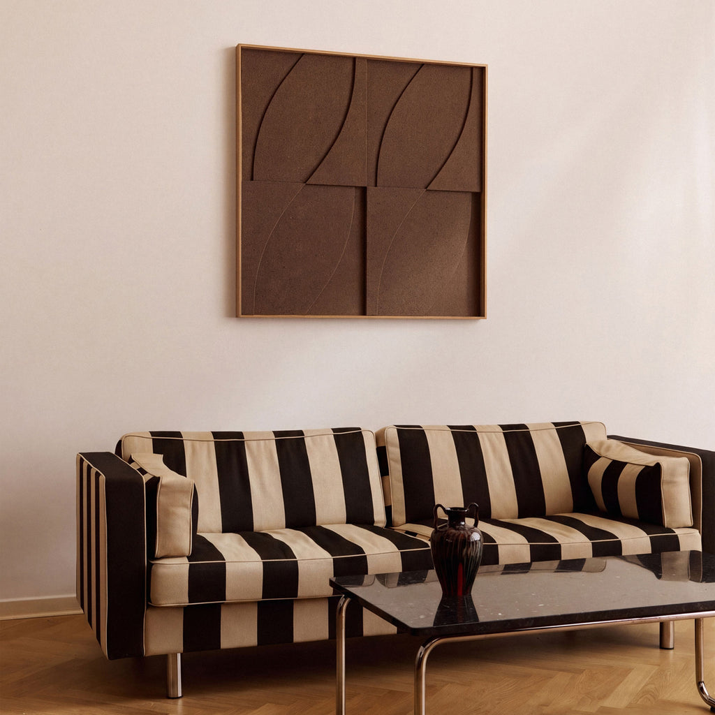Side view of a large textile acoustic artwork in dark brown color with an oak frame.