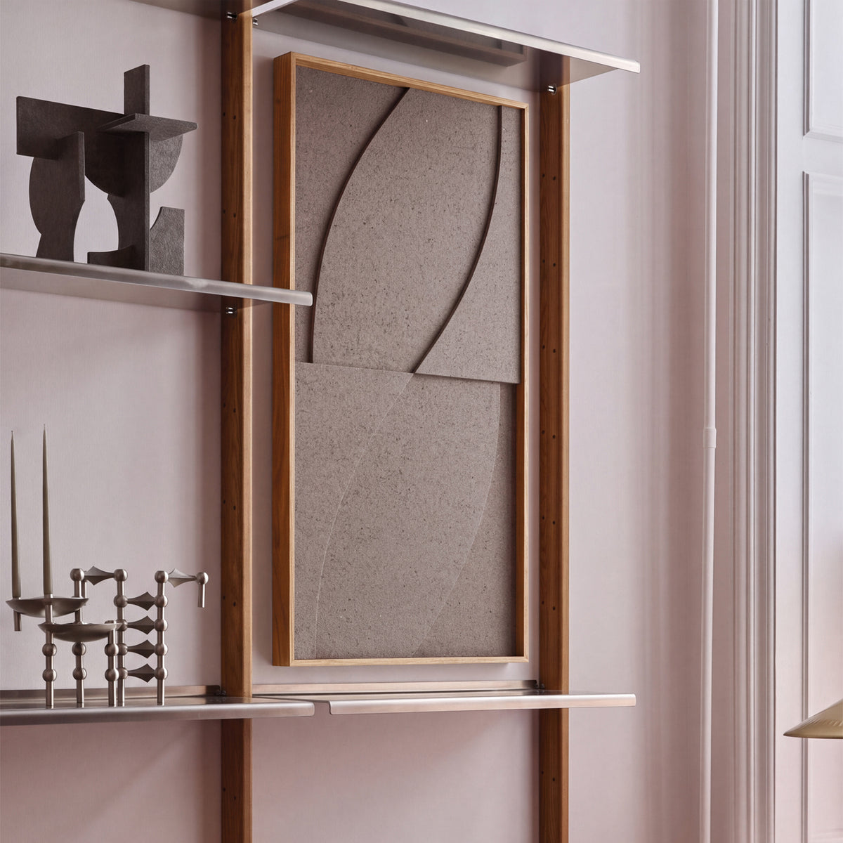 Side view of a textile acoustic artwork in taupe color with an oak frame.