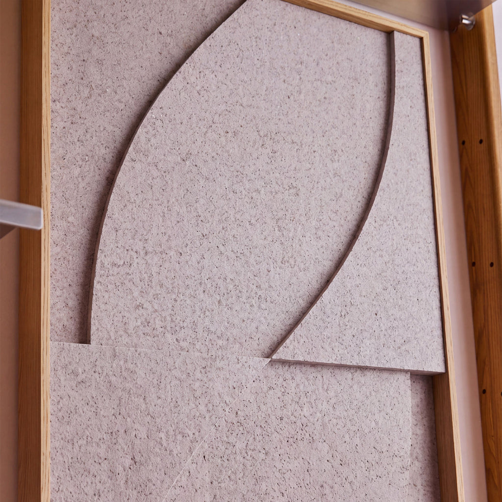 Close up of a textile acoustic artwork in taupe color with an oak frame.