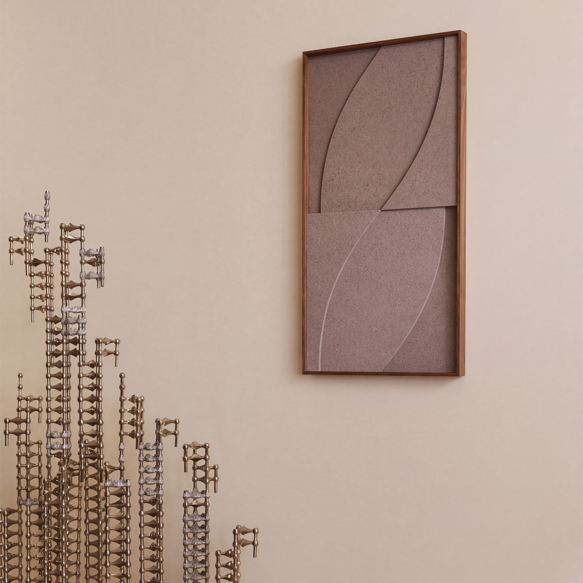 Front view of a textile acoustic artwork in taupe color with an walnut frame.