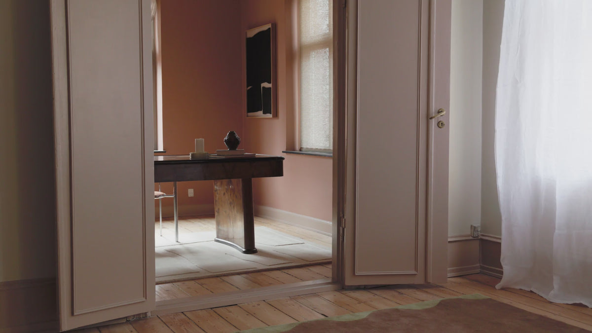 Different settings of living rooms, focusing on carpets on the floor.
