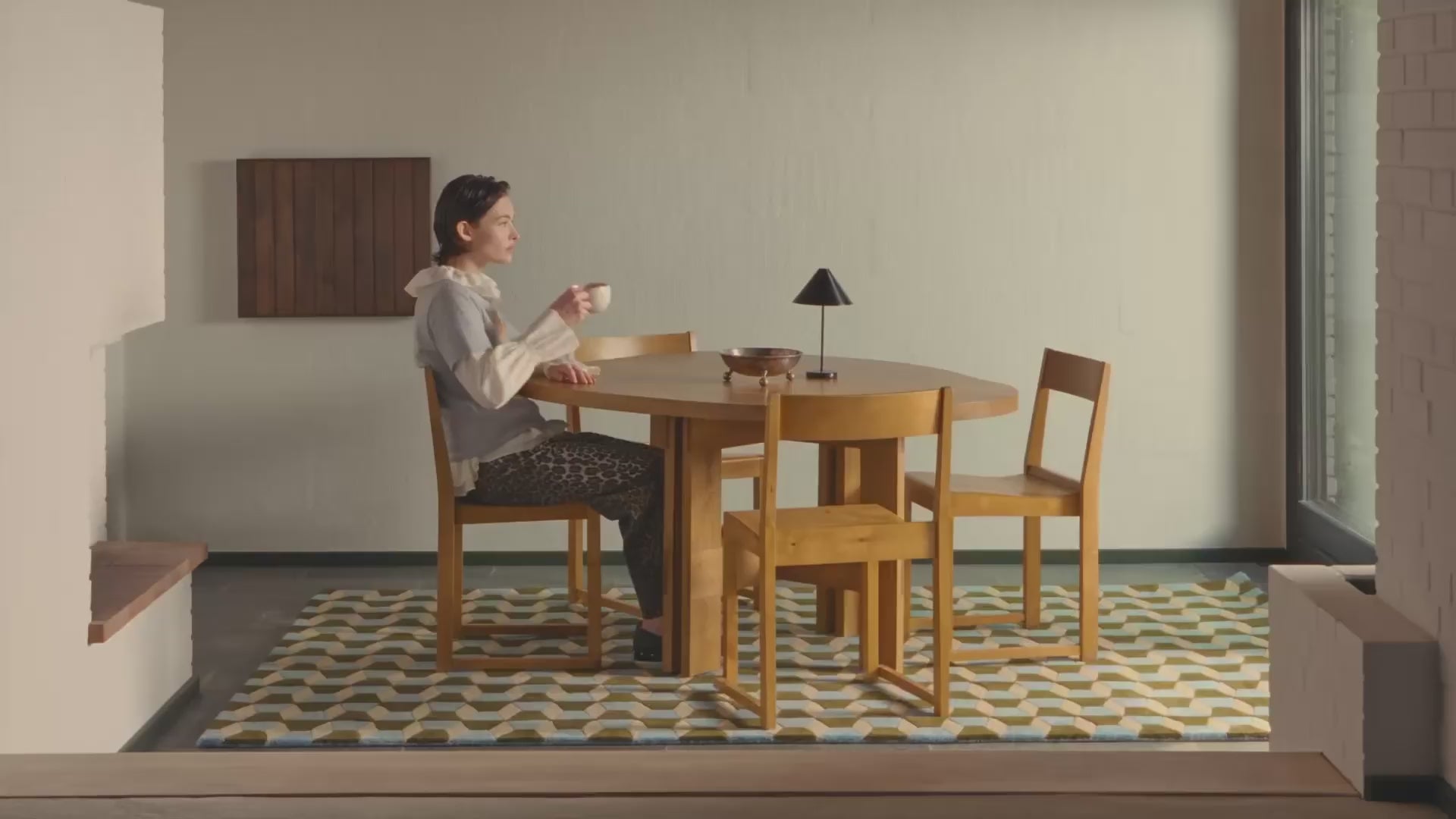 Showcasing of rugs in different settings of living rooms.